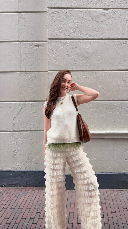 Mouwloze top creme met veren details | Restyled